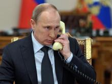 Владимир Путин не угрожал Петру Порошенко