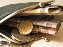 Минимальный уровень оплаты труда вырос на 411 рублей