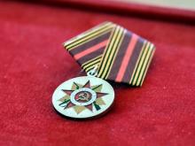 Президент РТ Рустам Минниханов наградил трех ветеранов из Набережных Челнов и одного из села Биклянь