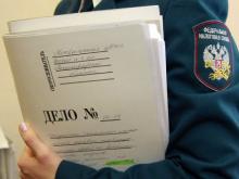 Владелец автостоянок должен по налогу на вмененный доход 5.7 миллионов рублей