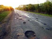 Дороги за Боровецким мостом залатают после 9 мая