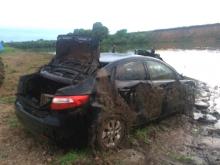 Версия следствия: избитого водителя засунули в багажник и утопили вместе с машиной (видео)