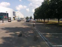 Кому принадлежит земля, на которой устроена парковка у бизнес-центра 2/18?