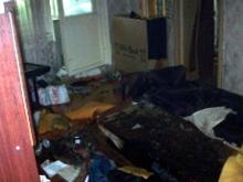 В доме 52/14 во время пожара в квартире спасли женщину