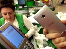 Владельцы смартфонов смогут безопасно оплачивать товары и услуги с помощью 'токенов'