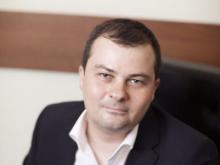 Кто продиктует Владимиру Путину экономическую программу - 'государственники' или 'частники'?