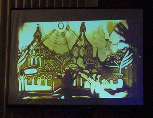 Песочная анимация - часть презентации.