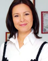 У Альфии Когогиной нет пролетарского прошлого, правда, школьницей она месяц поработала на швейной фабрике.